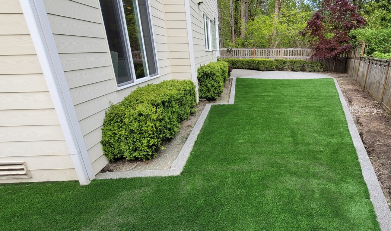 Professional artificial grass installation in Weston, FL backyard
